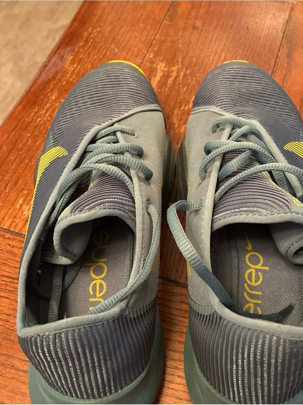 Nike Men’s Gray Athletic Shoes with Yellow Swoosh